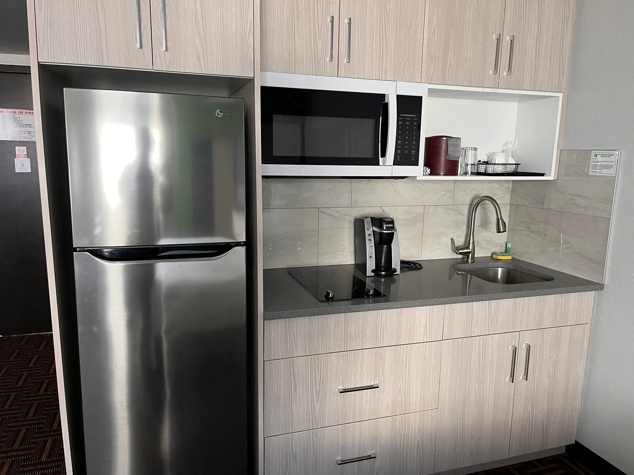Wyndham Garden kitchenette close-up with stainless steel appliances